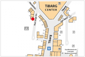 Auf dem Lageplan ist der Standort von dem Café und dem Feinkostladen "Hofladen & Dorfcafé" mit einem roten Kreis gekennzeichnet.